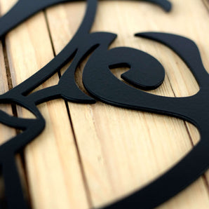 Close up of matte black powder coat on our Calla Lily garden metal sign.