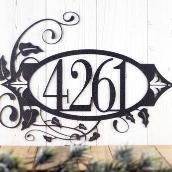4 digit metal house number sign with vines and fleur de lis, in silver vein powder coat.