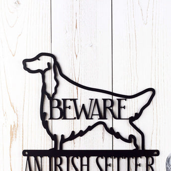 Close up of Irish Setter silhouette on our Irish Setters Live Here metal sign, with Beware, in matte black powder coat.