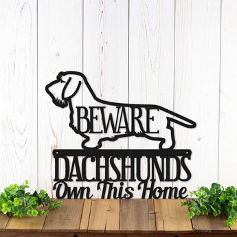 Dachshunds Own This Home metal wall art, with Beware and Wire Haired Dachshund, in matte black powder coat.