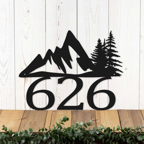 3 digit metal house number plaque with mountains and pine trees, in matte black powder coat.