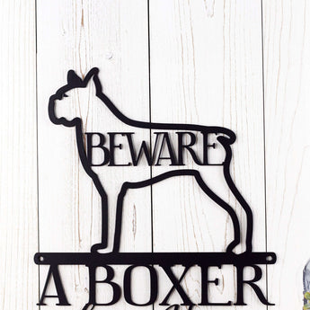 Close up of Boxer silhouette on our Boxer Lives Here metal sign, with Beware, in matte black powder coat.