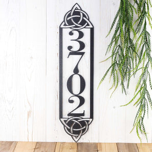Metal 4 digit vertical house number sign with Celtic knots, in silver vein powder coat. 