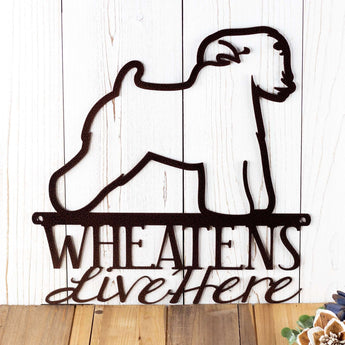 Close up of Wheatens Live Here dog metal sign, in copper vein powder coat. 