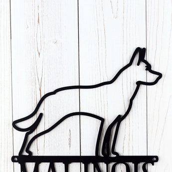 Close up of Malinois dog breed on our Malinois Live Here metal sign, in matte black powder coat.