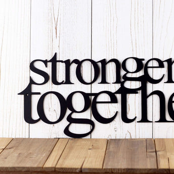 Close up of Stronger Together wording on our metal sign, in matte black powder coat.
