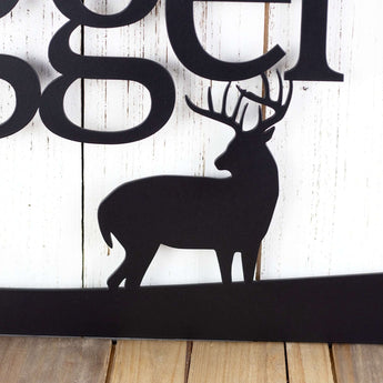 Close up of buck deer silhouette on our family name metal sign, in matte black powder coat.