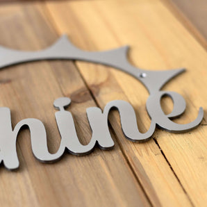 Close up of raw steel on our You Are My Sunshine metal sign.