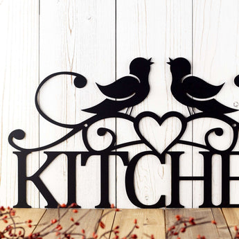 Close up of Kitchen metal sign with love birds and heart, in matte black powder coat.