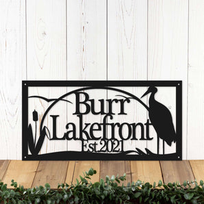 Rectangular Lake House metal sign with heron and cattails, in matte black powder coat.