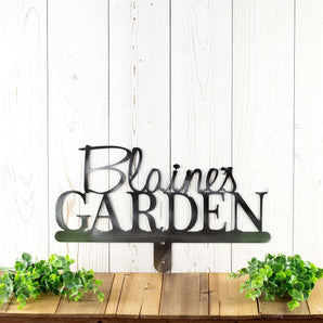 Personalized metal garden sign with first name, in raw steel.
