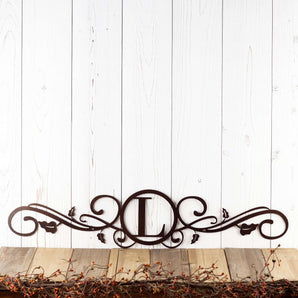 Metal monogram sign with vines, in copper vein powder coat.