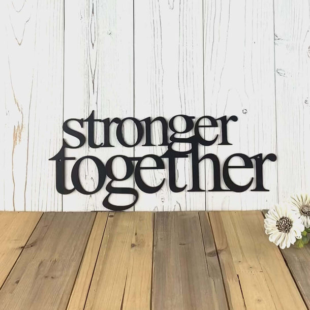 Video of Stronger together metal wall art, in matte black powder coat.