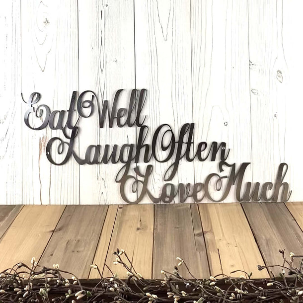 Video of Eat Well Laugh Often Love Much metal wall art, in raw steel.