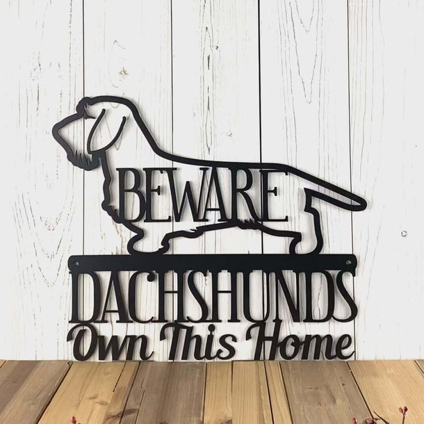 Video of Wired Dachshunds own this home metal sign, with beware, in matte black powder coat.