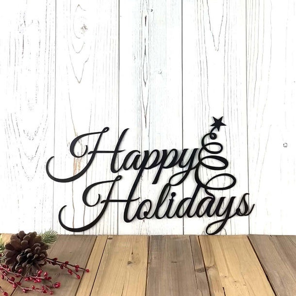 Video of Happy Holidays metal wall art with swirly Christmas tree, in matte black powder coat.