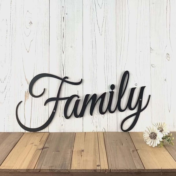 Video of cursive family metal sign, in matte black powder coat.