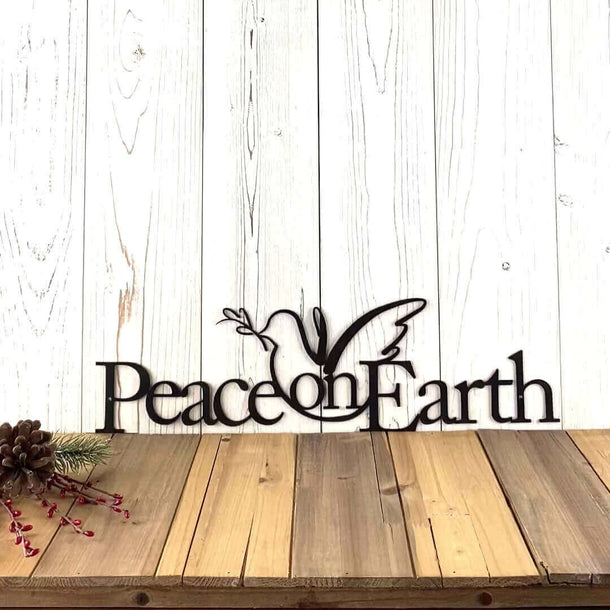 Video of Peace on Earth metal wall art, with a peace dove, in copper vein powder coat.