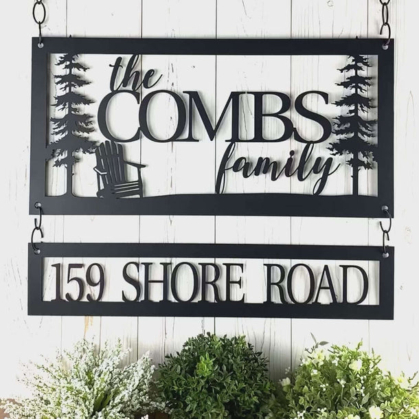 Video of Personalized family last name and address metal signs with adirondack chair cabin scene, in matte black powder coat.