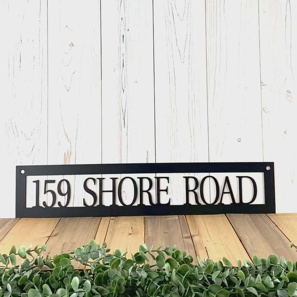 Video of rectangular metal address plaque, in matte black powder coat.