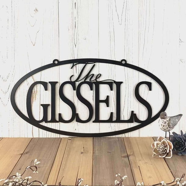 Video of oval family name and established year metal plaque, in matte black powder coat.