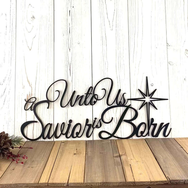 Video of Unto us a savior is born metal wall art, in matte black powder coat.