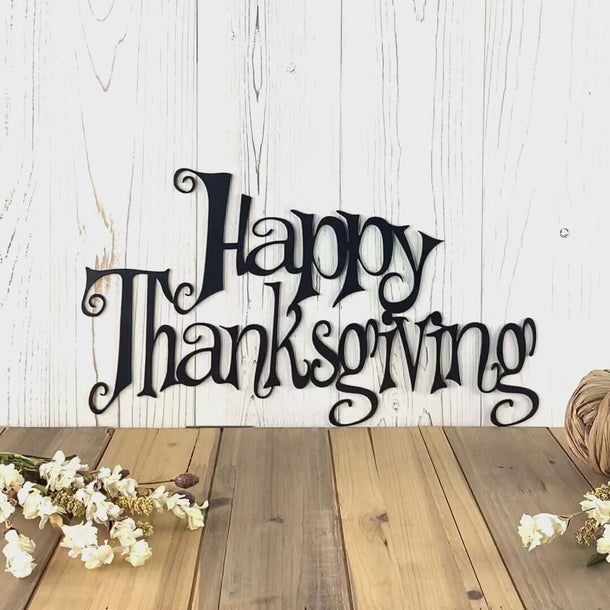 Video of Happy Thanksgiving metal wall art, in matte black powder coat.