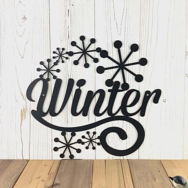 Video of Winter metal wall art with cute snowflakes, in matte black powder coat.