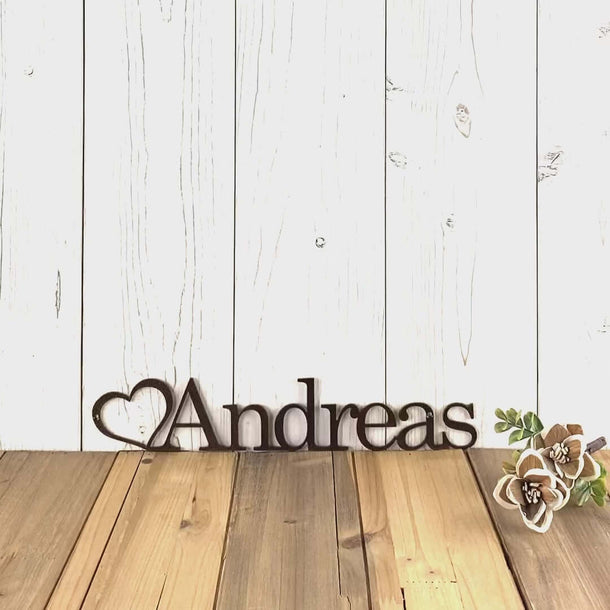 Video of personalized child name metal sign with heart, in copper vein powder coat.