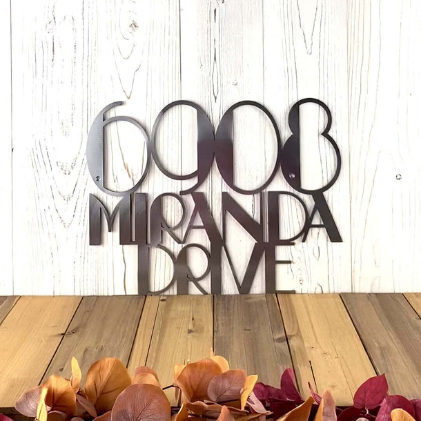 Video of modern metal address sign, in raw steel.