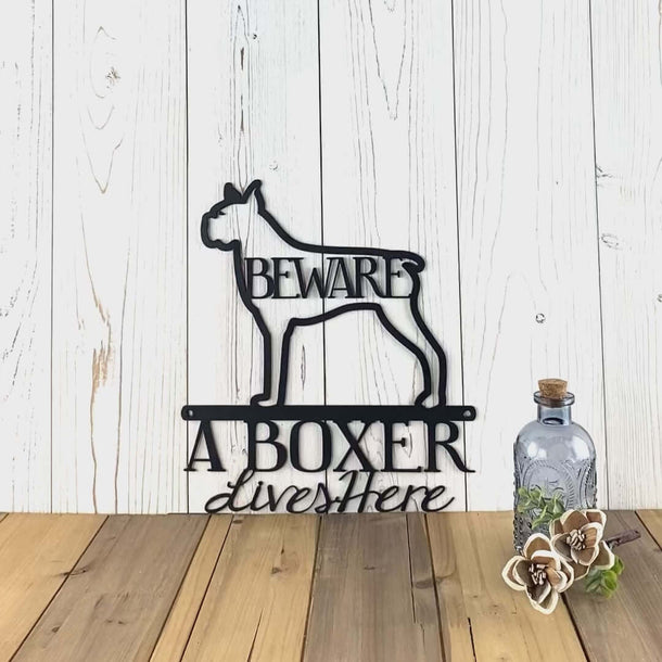 Video of Boxer lives here metal wall art, with beware, in matte black powder coat.