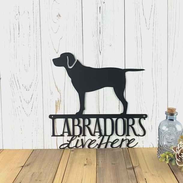 Video of Labradors live here metal wall art, in matte black powder coat.