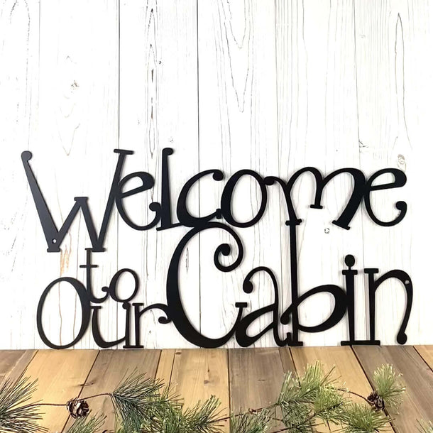 Video of Welcome to our cabin metal wall art, in matte black powder coat.