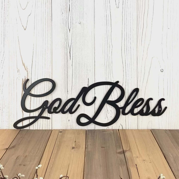 Video of God Bless script metal wall art, in matte black powder coat.