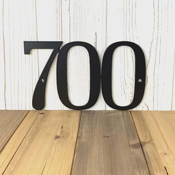 Video of horizontal metal house number sign, in matte black powder coat.