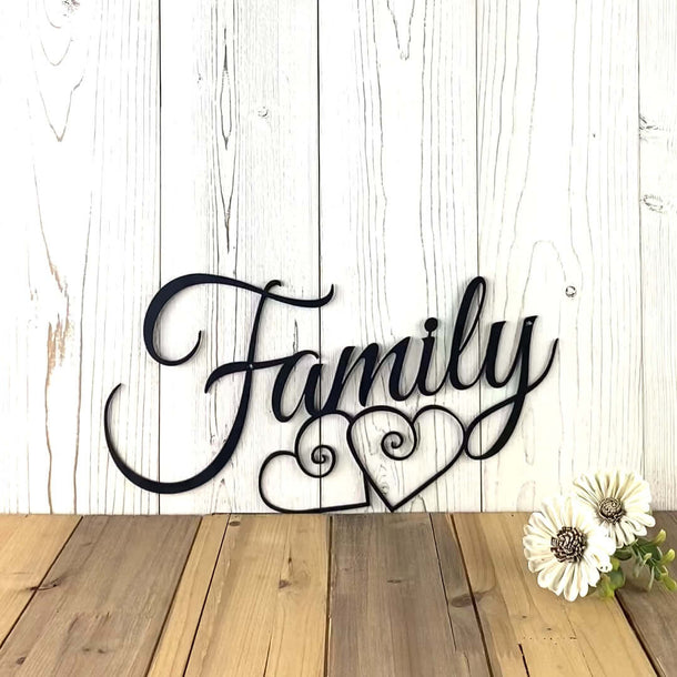 Video of script family metal wall art with two intertwining hearts, in matte black powder coat.