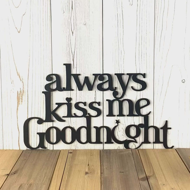 Video of Always Kiss me Goodnight metal wall art with moon and stars, in matte black powder coat.