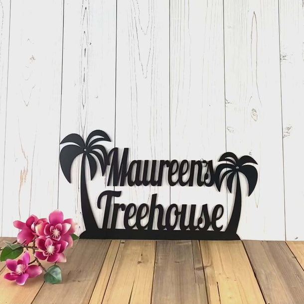Video of personalized family name metal sign with tropical palm trees, in matte black powder coat.