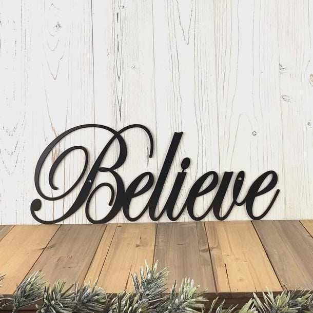 Video of script Believe metal wall art, in matte black powder coat.