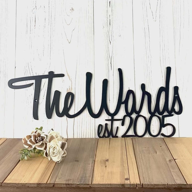 Video of script family name and established year metal sign, in matte black powder coat.