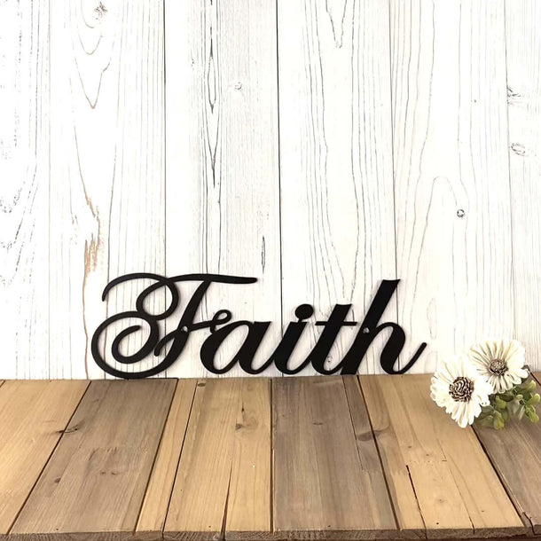 Video of cursive Faith metal wall art, in matte black powder coat.
