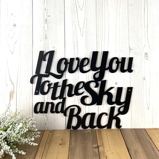 Video of I love you to the sky and back metal wall art, in matte black powder coat.
