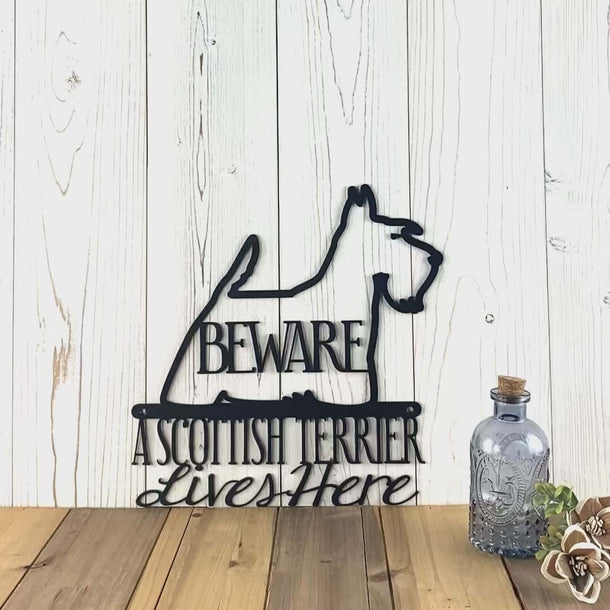 Video of A Scottish Terrier lives here metal wall art, with beware, in matte black powder coat.