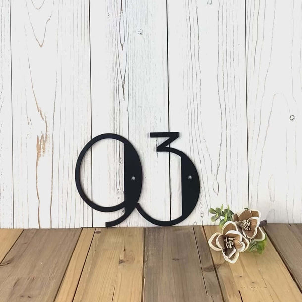 Video of modern metal house number sign, in matte black powder coat.