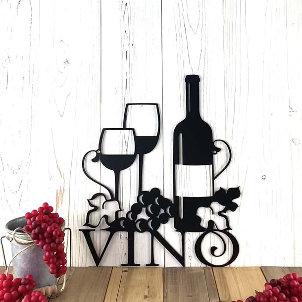 Video of Vino metal wall art with grapes, grapevines, wine bottle, and glasses, in matte black powder coat.