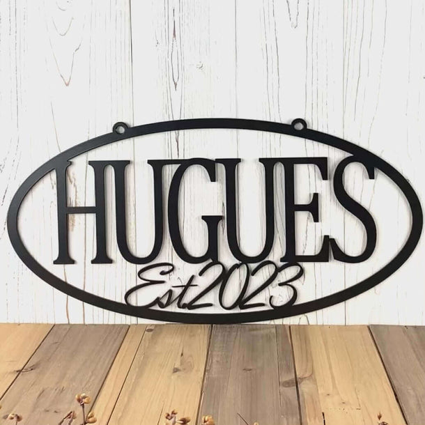 Video of oval family name and established year metal sign, in matte black powder coat.