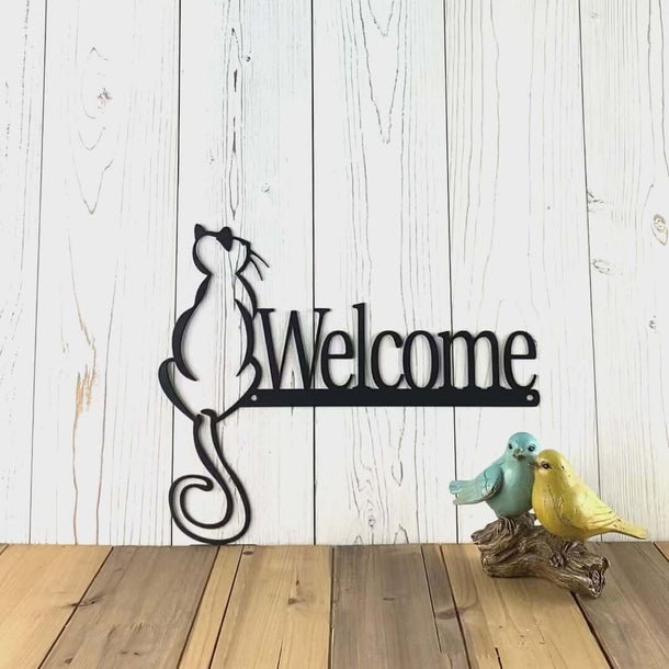 Video of welcome metal sign with cat sitting on ledge, in matte black powder coat.