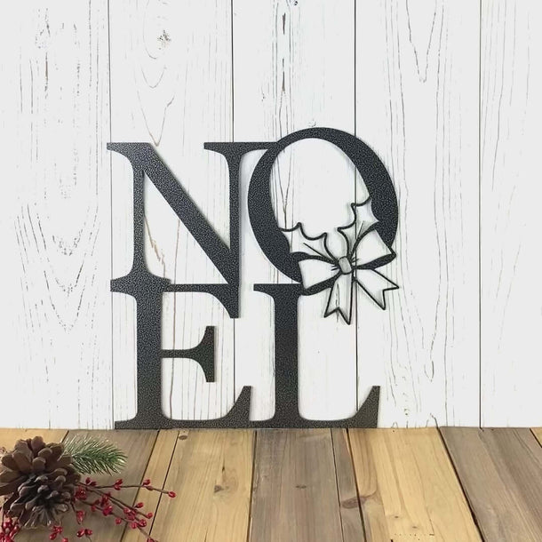 Video of Noel metal sign with Christmas wreath, in silver vein powder coat.